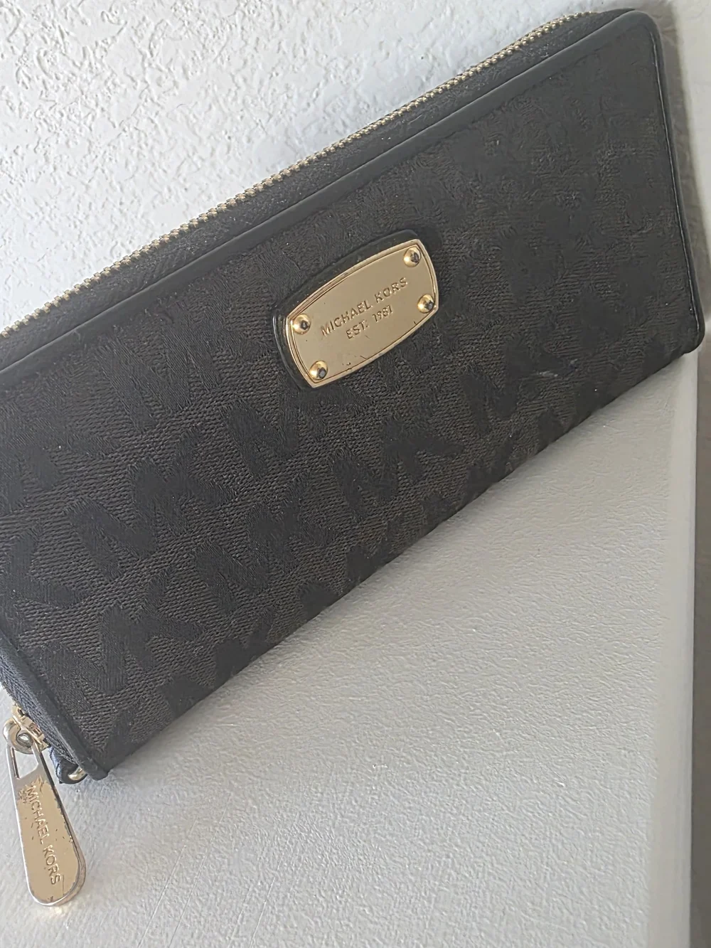 Michael Kors Black and Gold Logo Zip Around Wallet